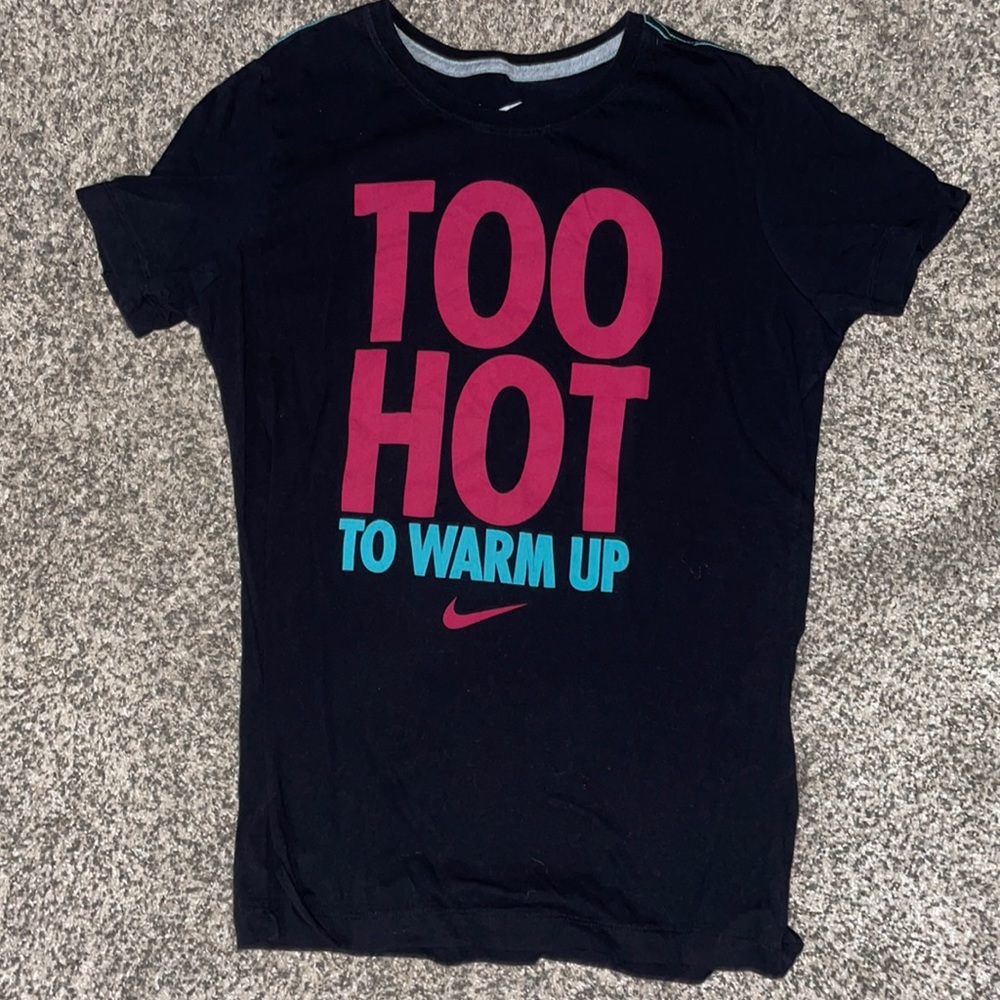 Black, pink, and blue Nike shirt.